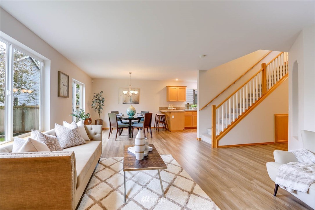 6731 Southeast 3rd Street Renton, WA 98059 - Photo 7 of 31 a living room with furniture and wooden floor