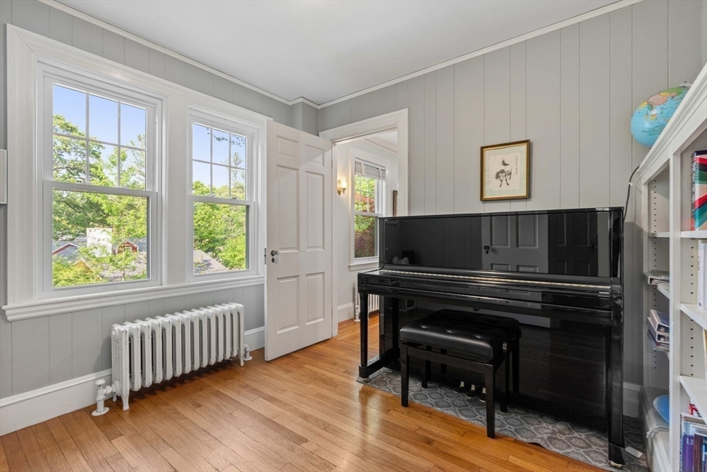 77 Meriam Street Lexington, MA 02420 - Photo 15 of 35 a view of a livingroom with furniture and windows