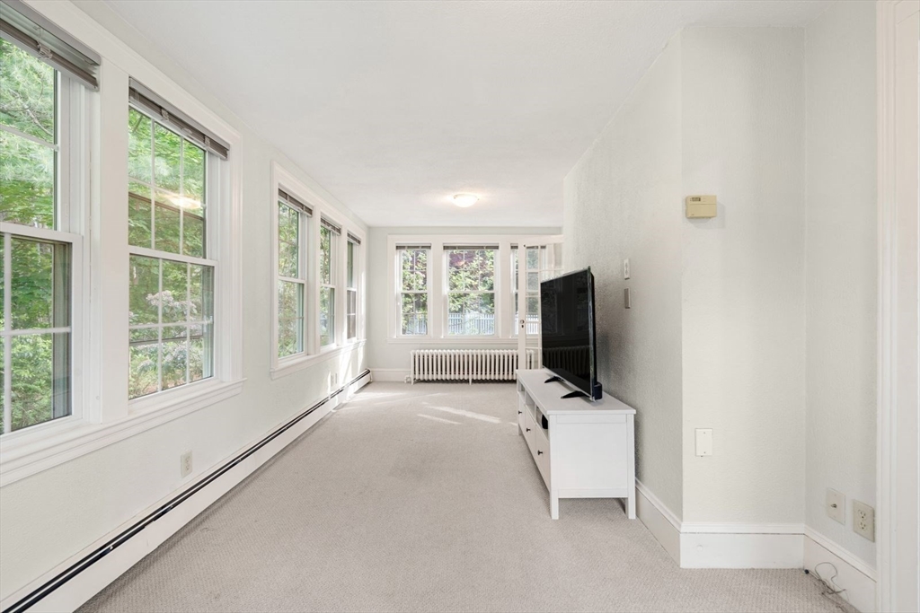 77 Meriam Street Lexington, MA 02420 - Photo 16 of 35 a view of room with window and tv