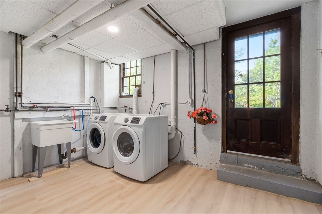 77 Meriam Street Lexington, MA 02420 - Photo 28 of 35 a utility room with dryer and washer