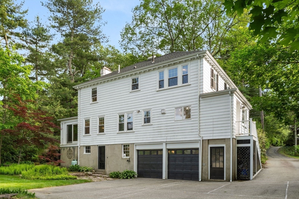 77 Meriam Street Lexington, MA 02420 - Photo 29 of 35 a view of house with a yard