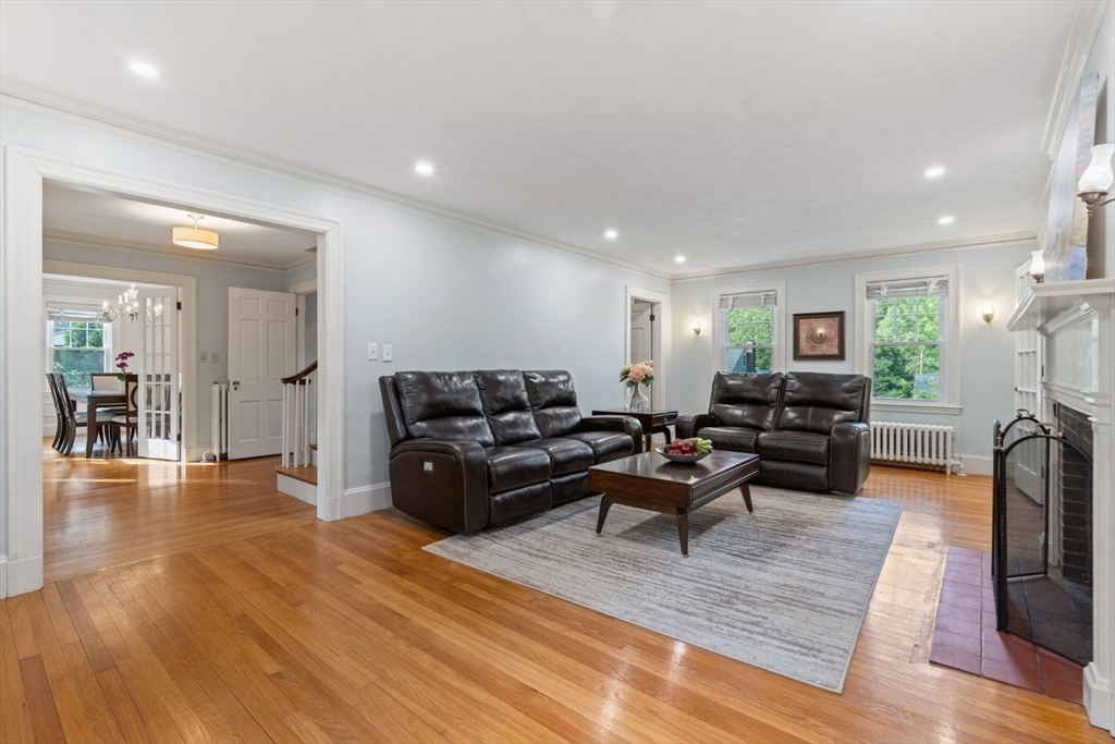 77 Meriam Street Lexington, MA 02420 - Photo 5 of 35 a living room with furniture and a wooden floor