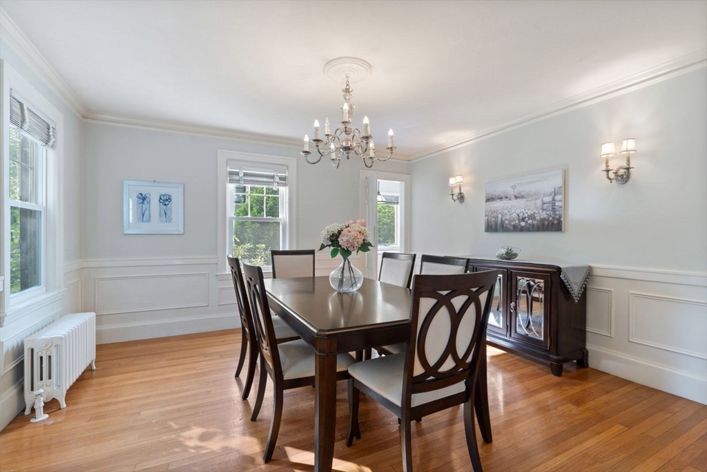 77 Meriam Street Lexington, MA 02420 - Photo 10 of 35 a view of a dining room with furniture and wooden floor