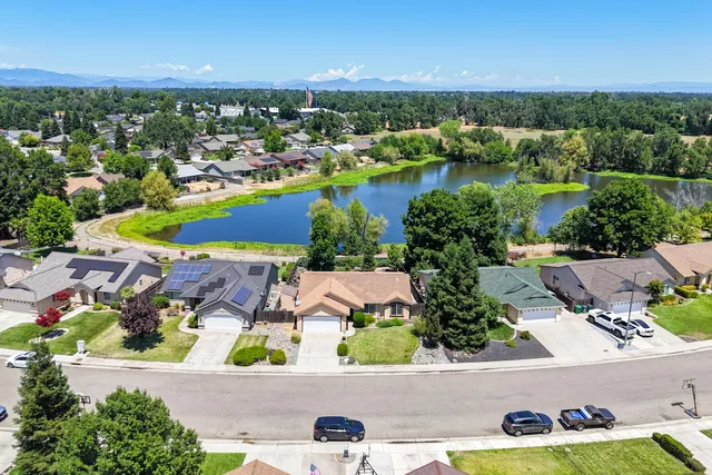 an aerial view of lake residential house with outdoor space