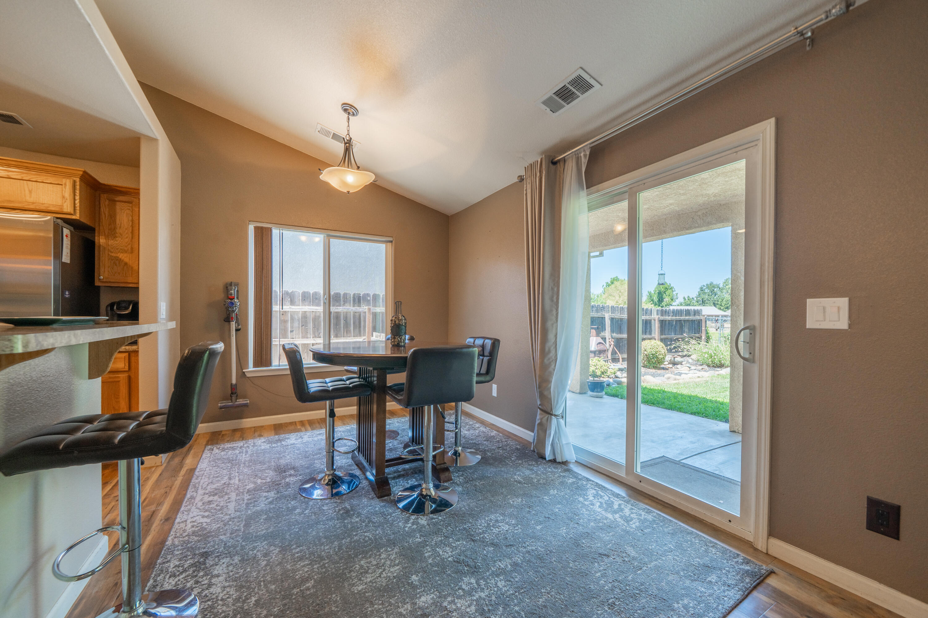 3388 Oak Street Anderson, CA 96007 - Photo 8 of 36 a view of a livingroom with furniture window and wooden floor
