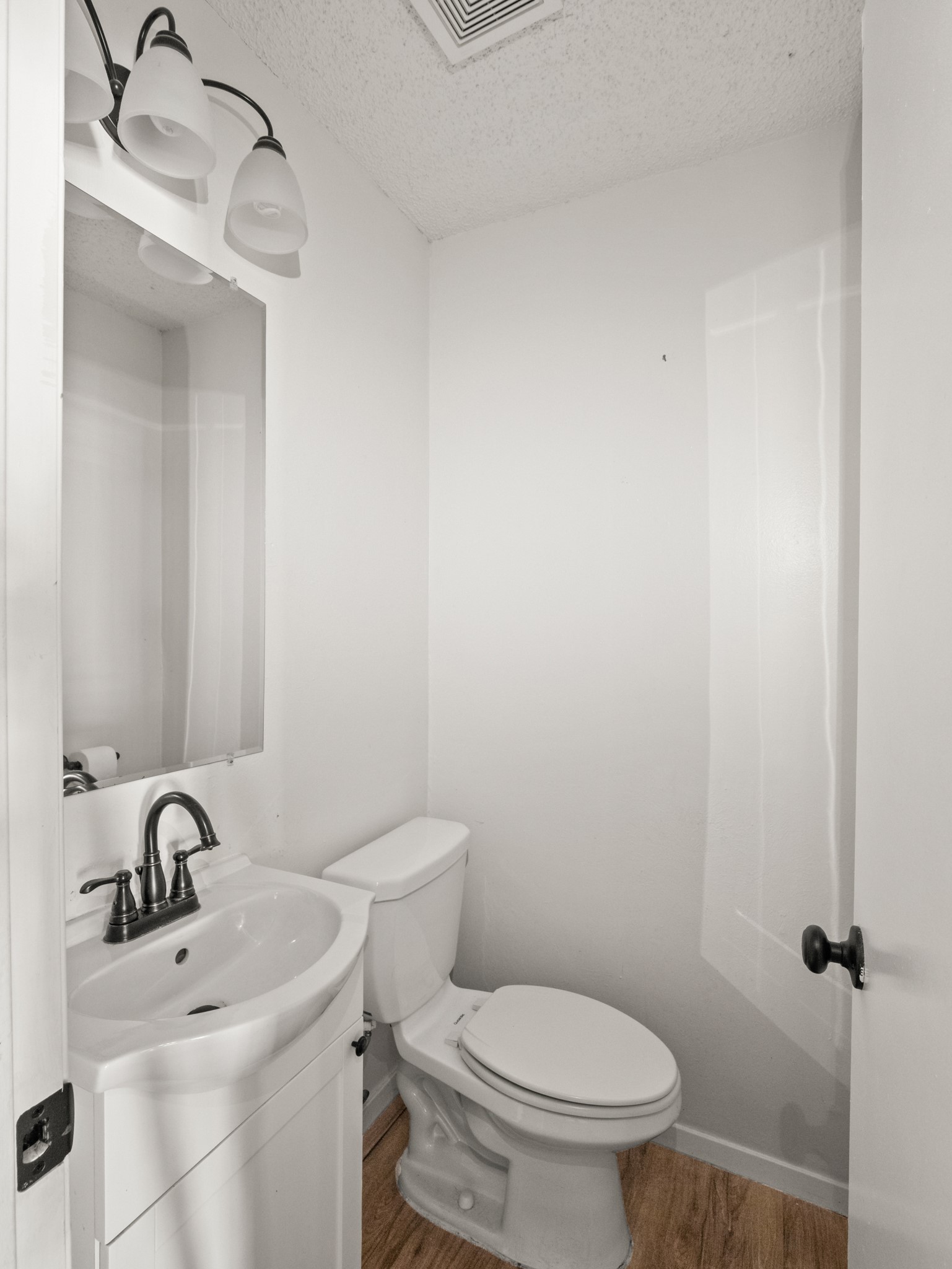 3507 Alpine Circle, Unit 3 Austin, TX 78704 - Photo 7 of 9 a bathroom with a sink and a toilet