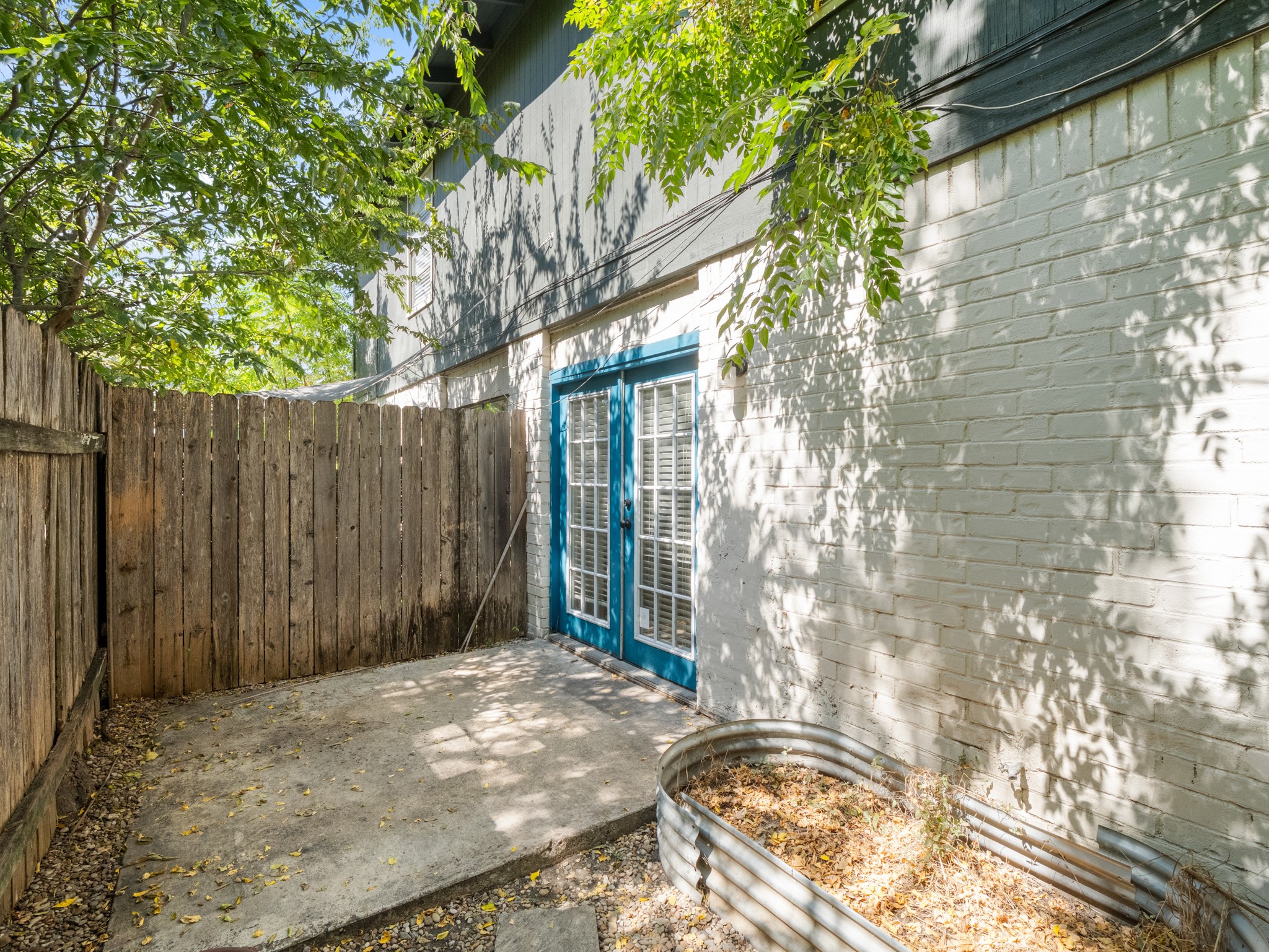3507 Alpine Circle, Unit 3 Austin, TX 78704 - Photo 9 of 9 a view of backyard with tree