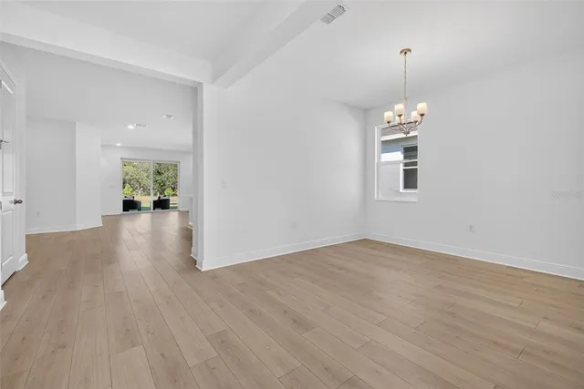 a view of an empty room and window