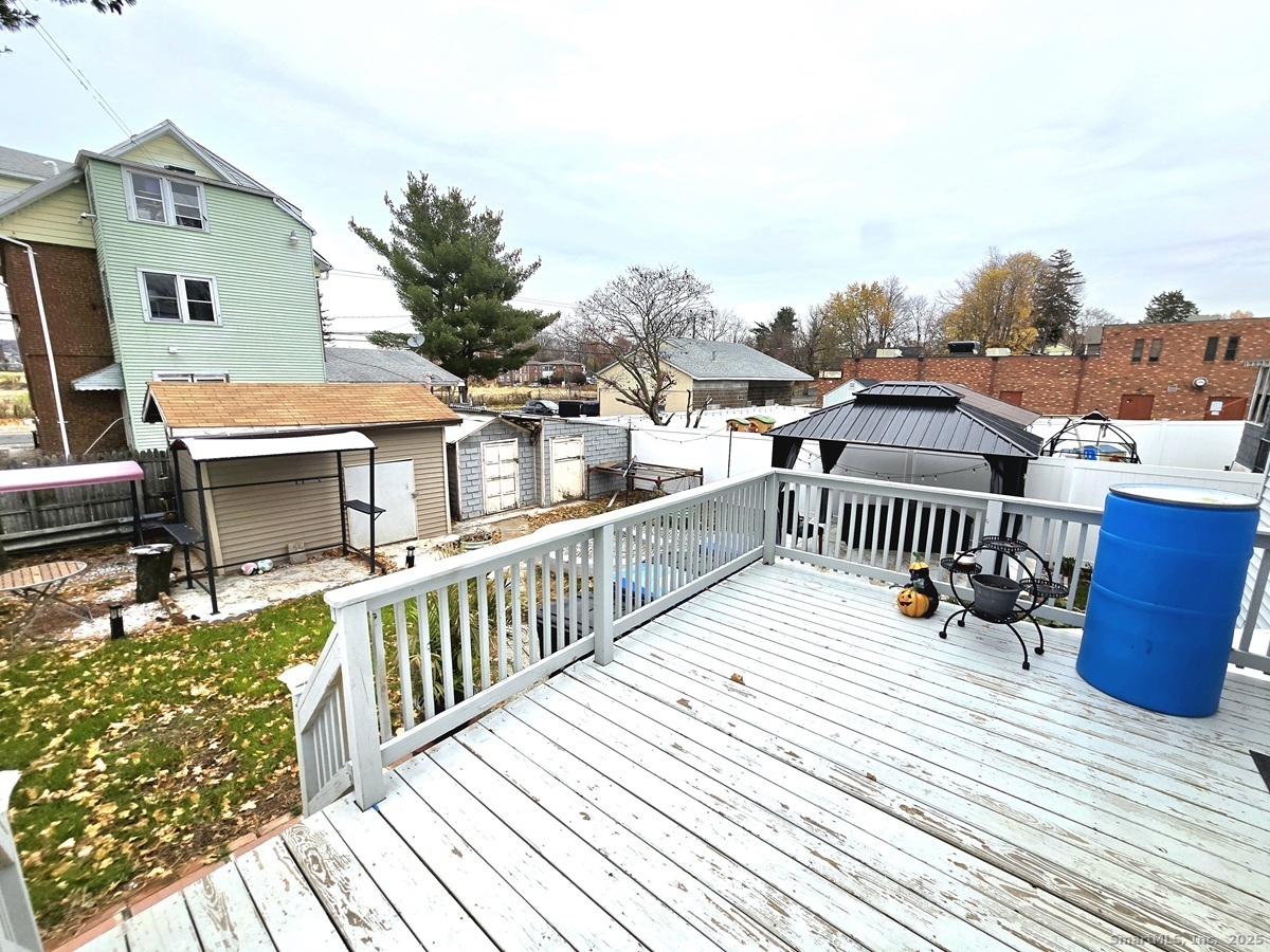 24 Acorn Street, Unit 2 New Britain, CT 06051 - Photo 11 of 12 a view of balcony with deck and wooden floor