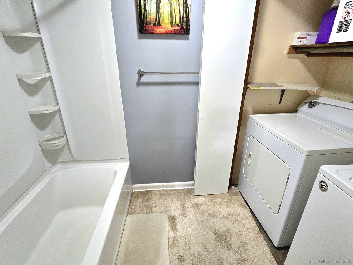 24 Acorn Street, Unit 2 New Britain, CT 06051 - Photo 10 of 12 a bathroom with a sink and a tub