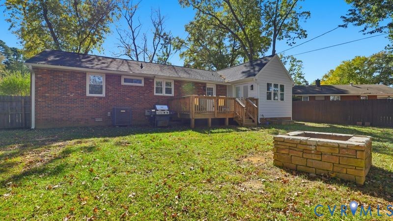 2962 Gaffney Road North Chesterfield, VA 23237 - Photo 31 of 37 Rear view of house featuring a deck, brick siding,