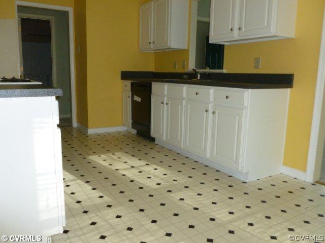 5010 Niles Road Richmond, VA 23234 - Photo 2 of 7 a bathroom with a sink a vanity and a shower