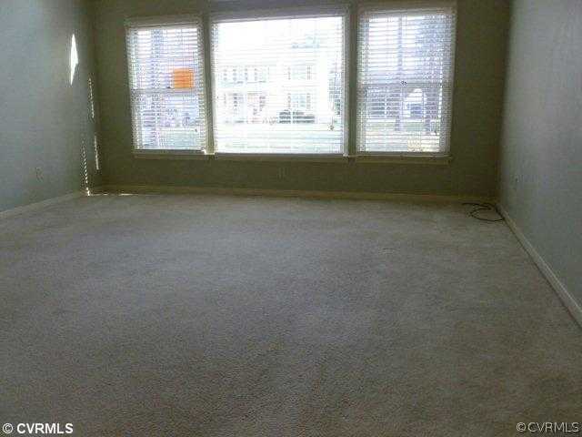 5010 Niles Road Richmond, VA 23234 - Photo 4 of 7 an empty room with windows