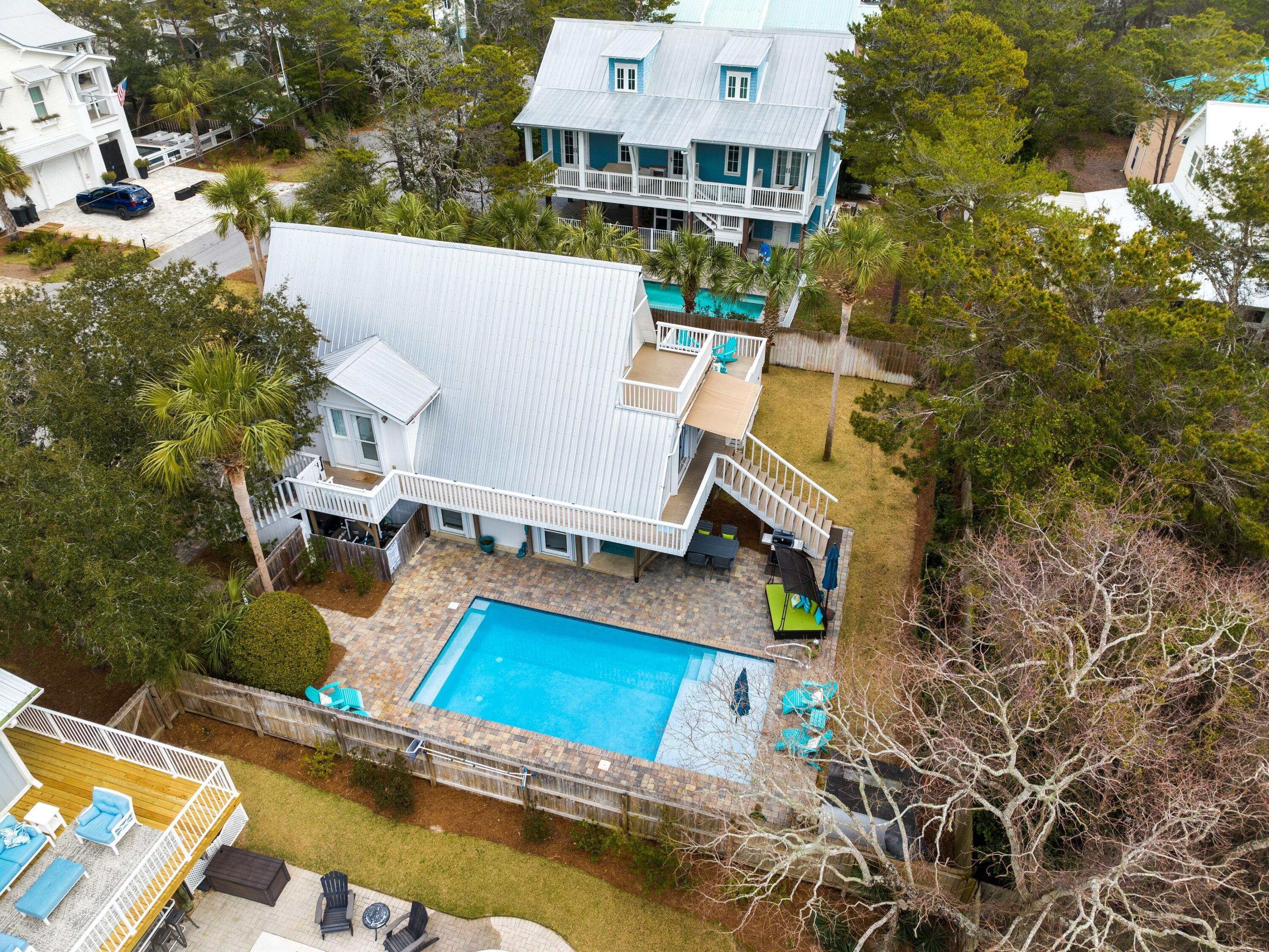 124 Buddy Street Santa Rosa Beach, FL 32459 - Photo 16 of 42 aerial view of a house with swimming pool and sitting area