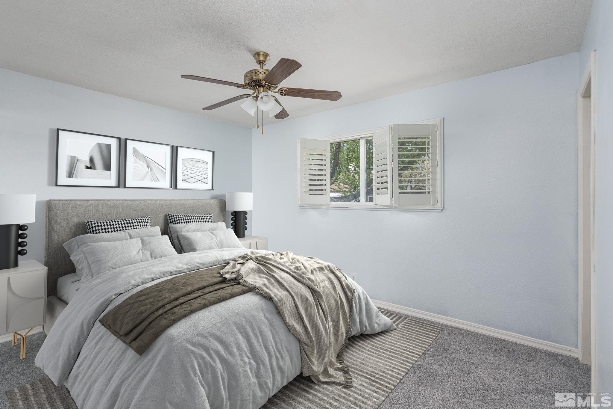 1065 Beldon Way Reno, NV 89503 - Photo 15 of 35 a bedroom with a bed and a window