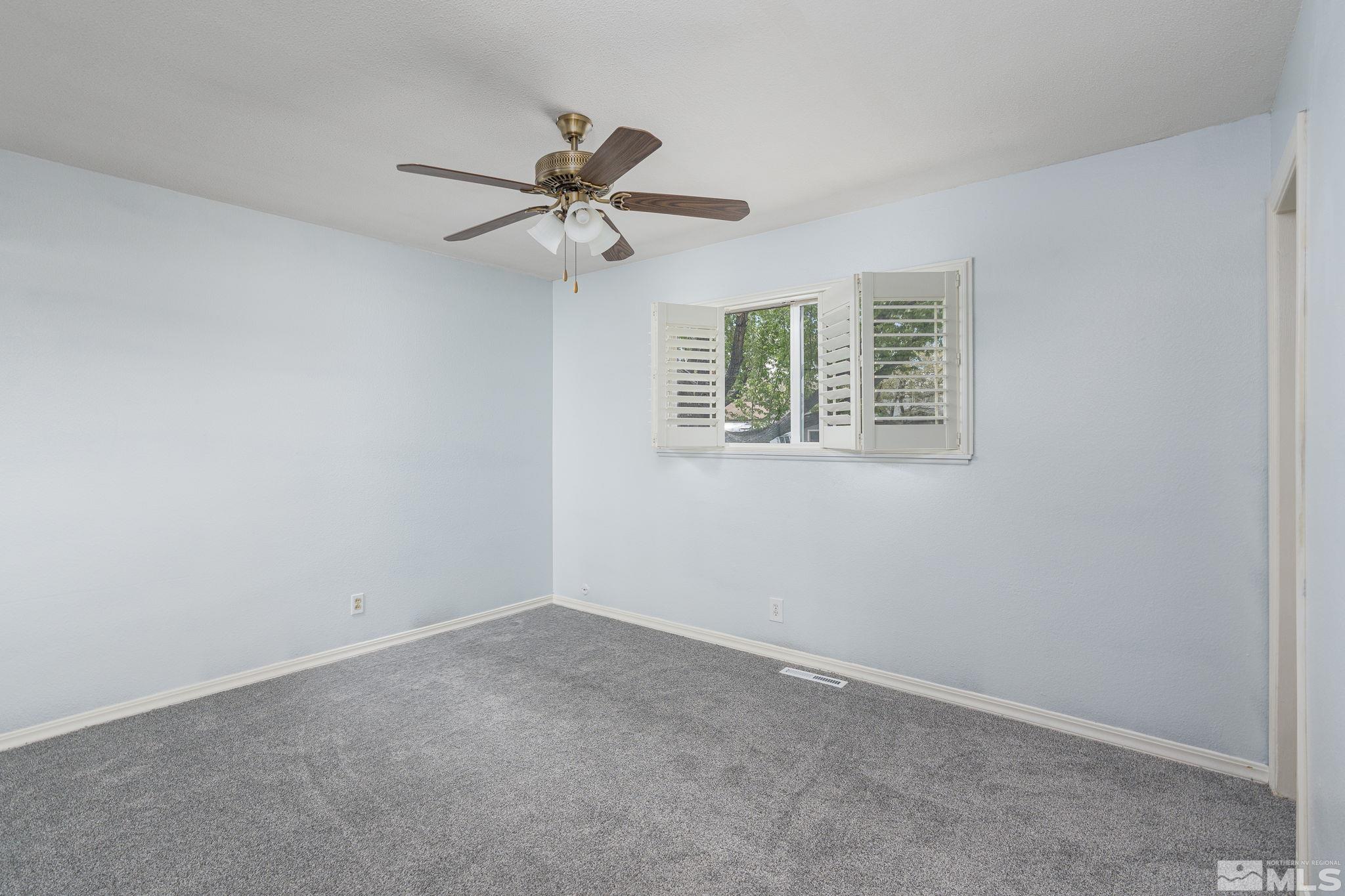 1065 Beldon Way Reno, NV 89503 - Photo 16 of 35 a view of an empty room with a window
