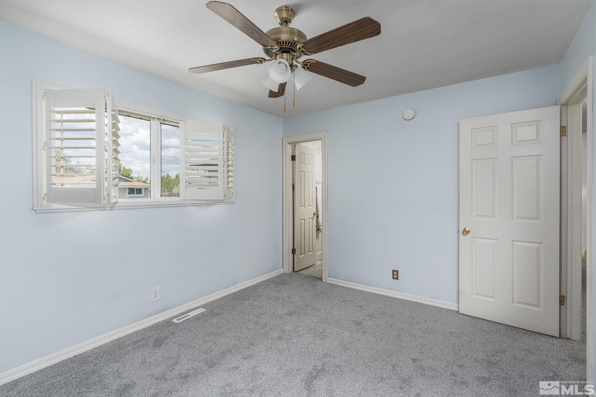 1065 Beldon Way Reno, NV 89503 - Photo 17 of 35 a view of an empty room with a window