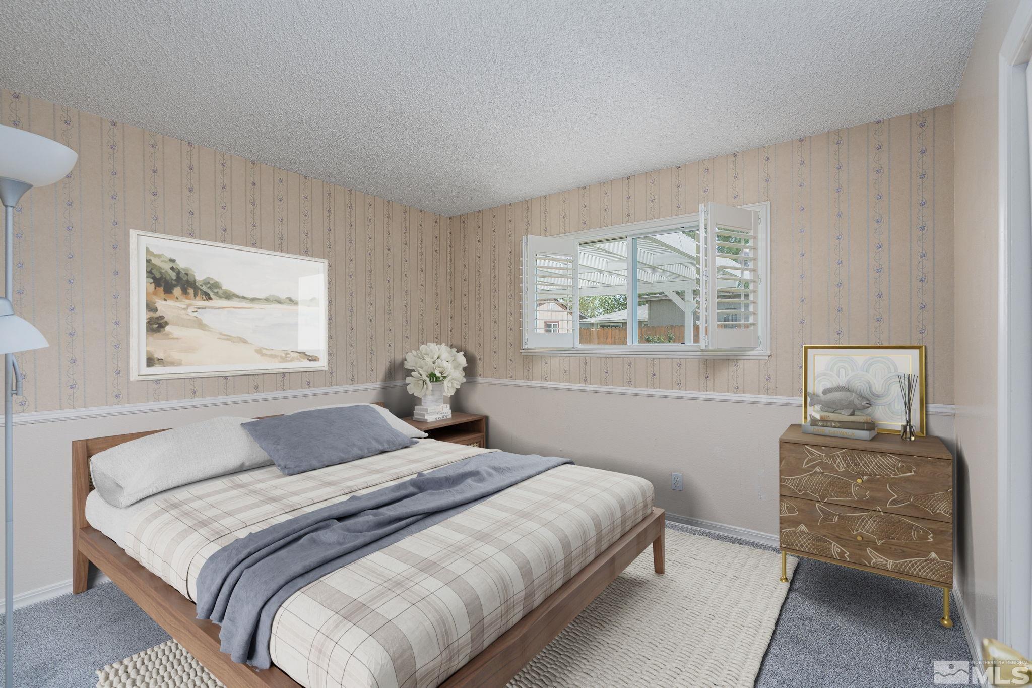 1065 Beldon Way Reno, NV 89503 - Photo 21 of 35 a bedroom with a bed and a window