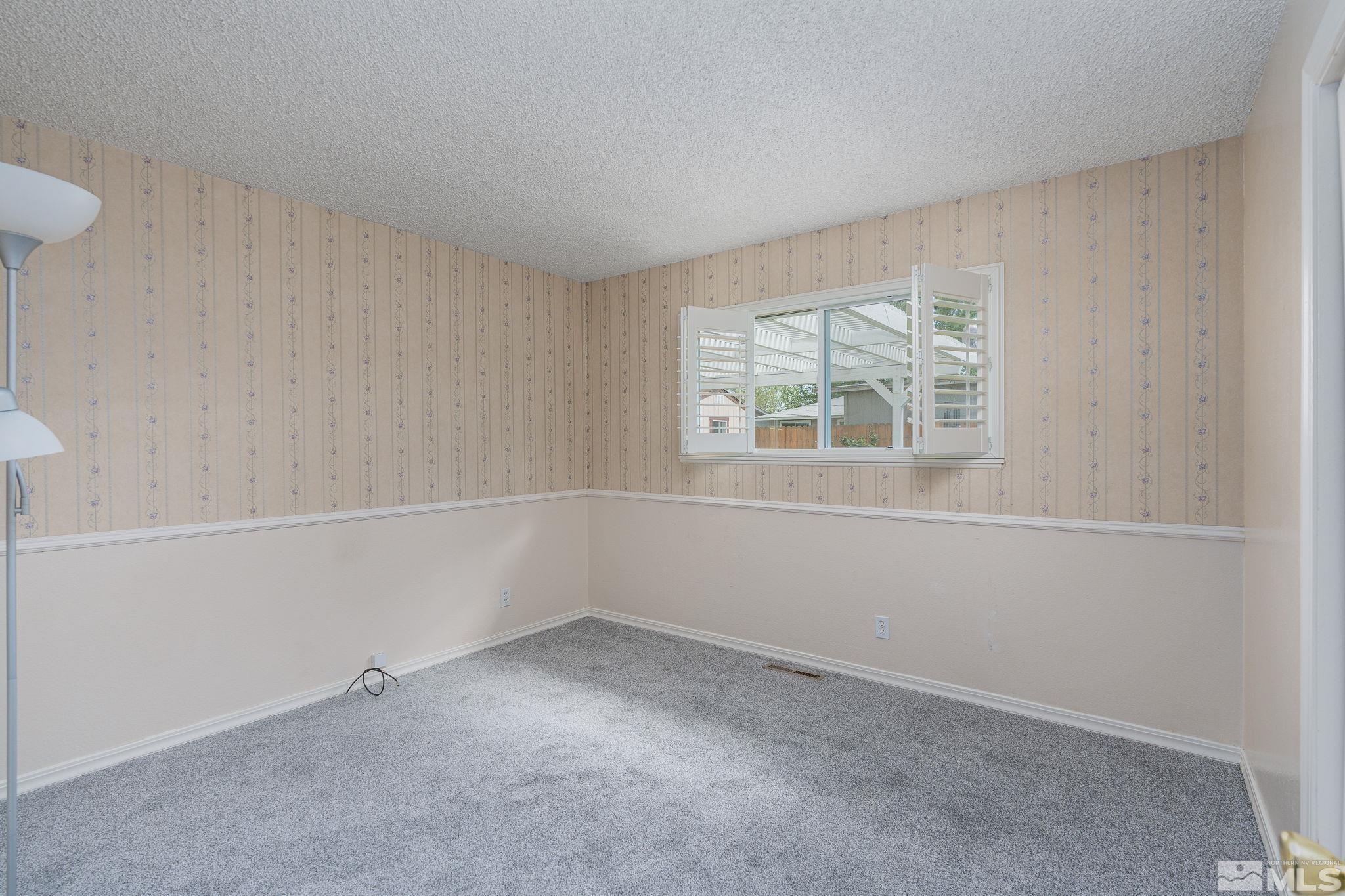 1065 Beldon Way Reno, NV 89503 - Photo 22 of 35 an empty room with a window