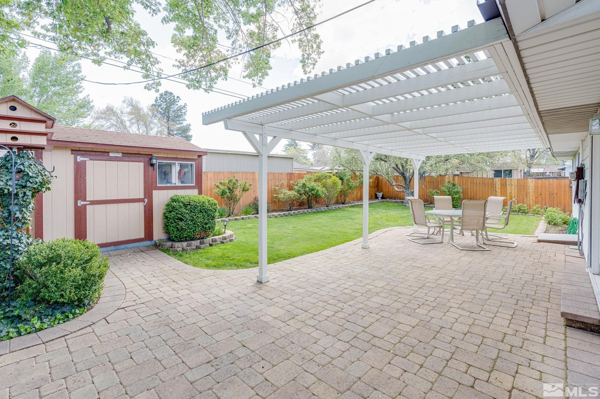 1065 Beldon Way Reno, NV 89503 - Photo 28 of 35 a view of a porch with furniture and garden