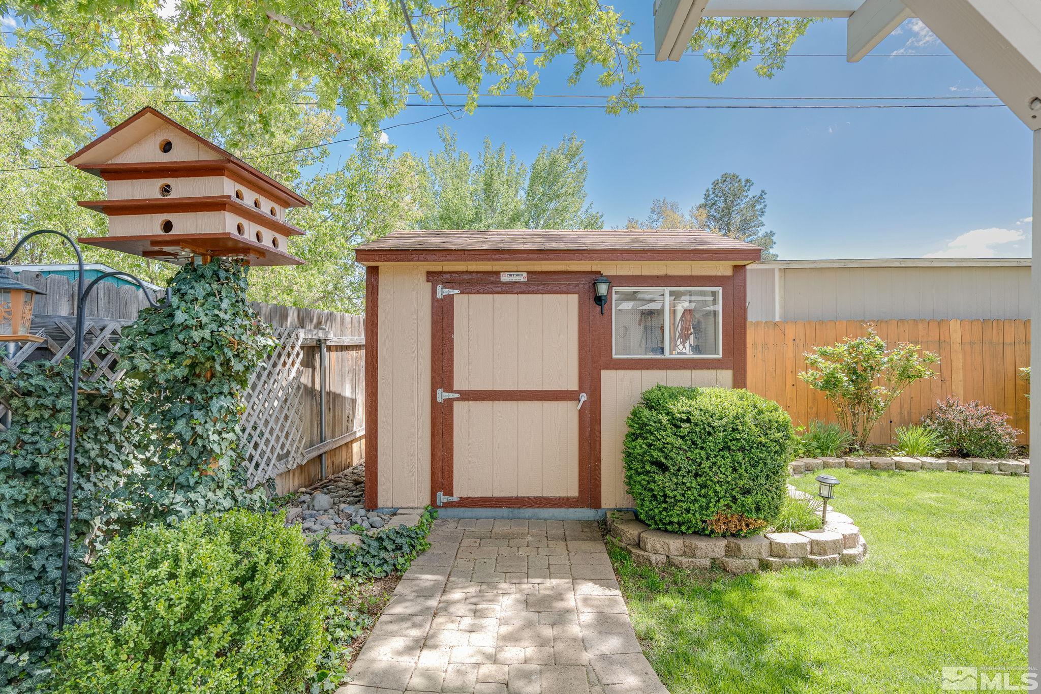 1065 Beldon Way Reno, NV 89503 - Photo 31 of 35 a front view of a house with garden