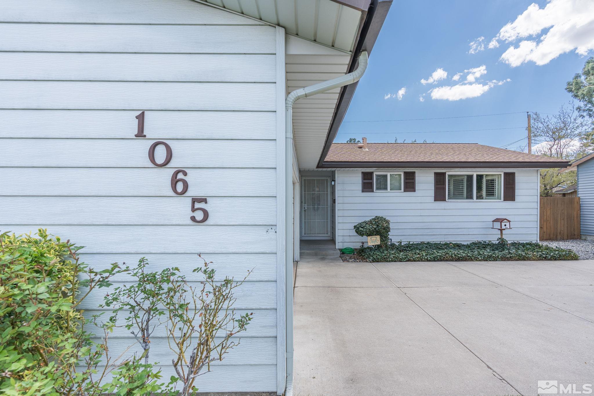 1065 Beldon Way Reno, NV 89503 - Photo 4 of 35 a view of house with a potted plant around