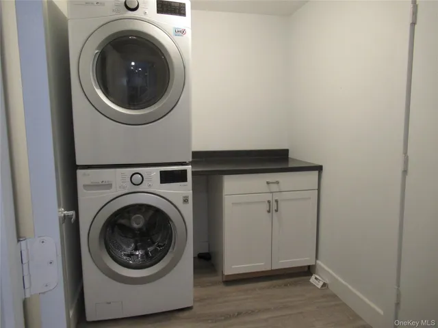 a utility room with dryer and washer