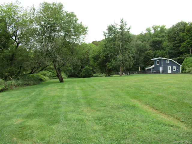 a house view with a play ground