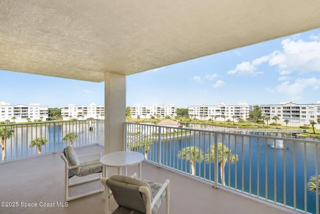 a view of a balcony with lake view and ocean view