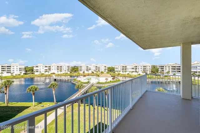 a view of a balcony with city view