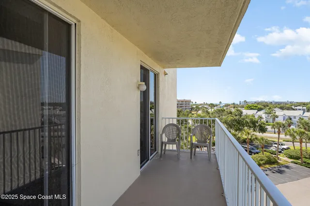 a view of a balcony with city view