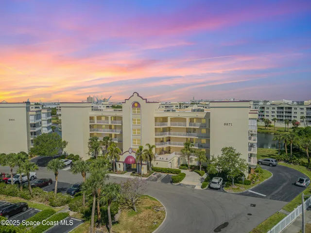 a view of a balcony with sitting area