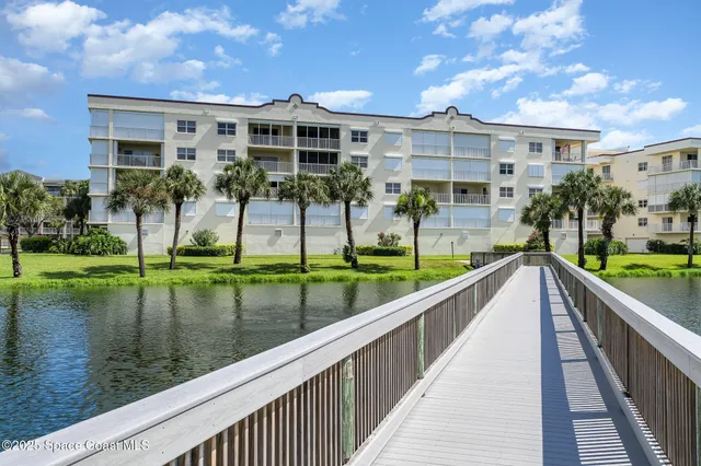 a view of swimming pool with outdoor seating