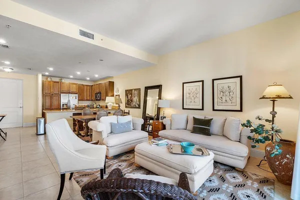 a living room with furniture and a table