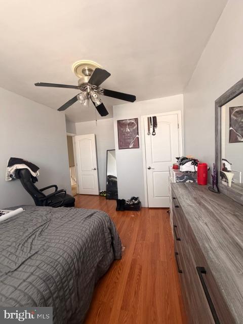 7206 Montague Street Philadelphia, PA 19135 - Photo 13 of 15 a bedroom with a bed and wooden floor