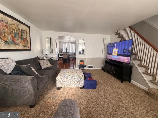 7206 Montague Street Philadelphia, PA 19135 - Photo 4 of 15 a living room with furniture and a couch