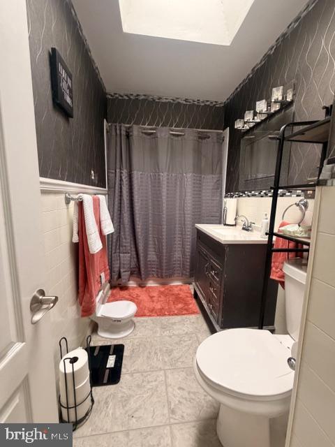 7206 Montague Street Philadelphia, PA 19135 - Photo 9 of 15 a bathroom with a sink toilet and shower