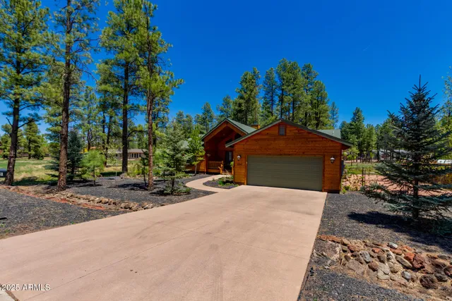 a pathway of a house with a yard