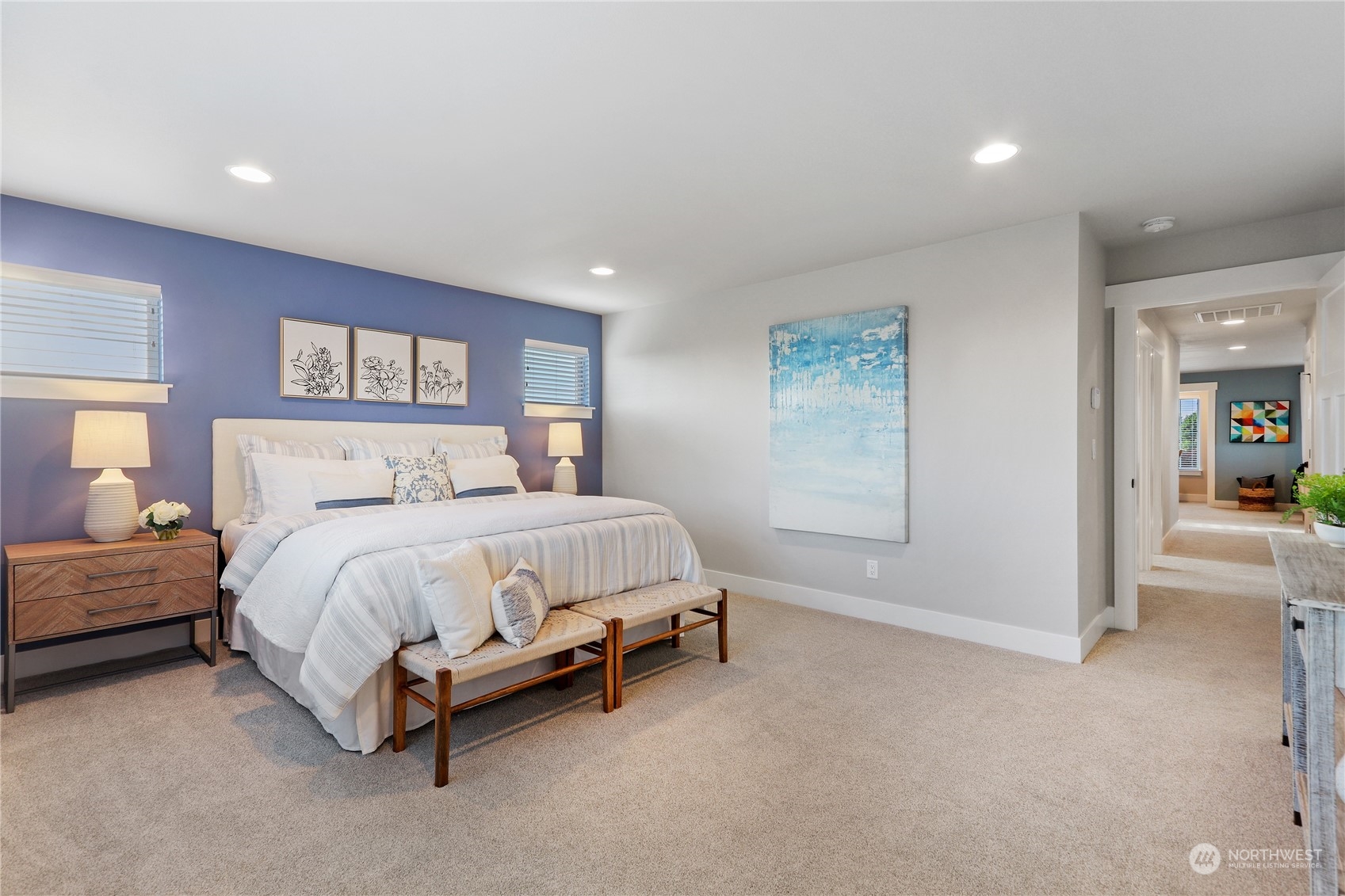 4418 242nd Place Southeast, Unit SL 25 Bothell, WA 98021 - Photo 18 of 36 a spacious bedroom with a bed and a walk in closet