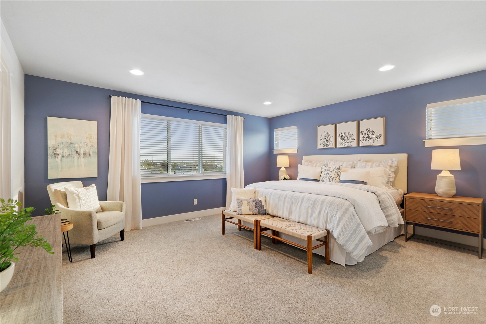 4418 242nd Place Southeast, Unit SL 25 Bothell, WA 98021 - Photo 19 of 36 a spacious bedroom with a bed and a couch