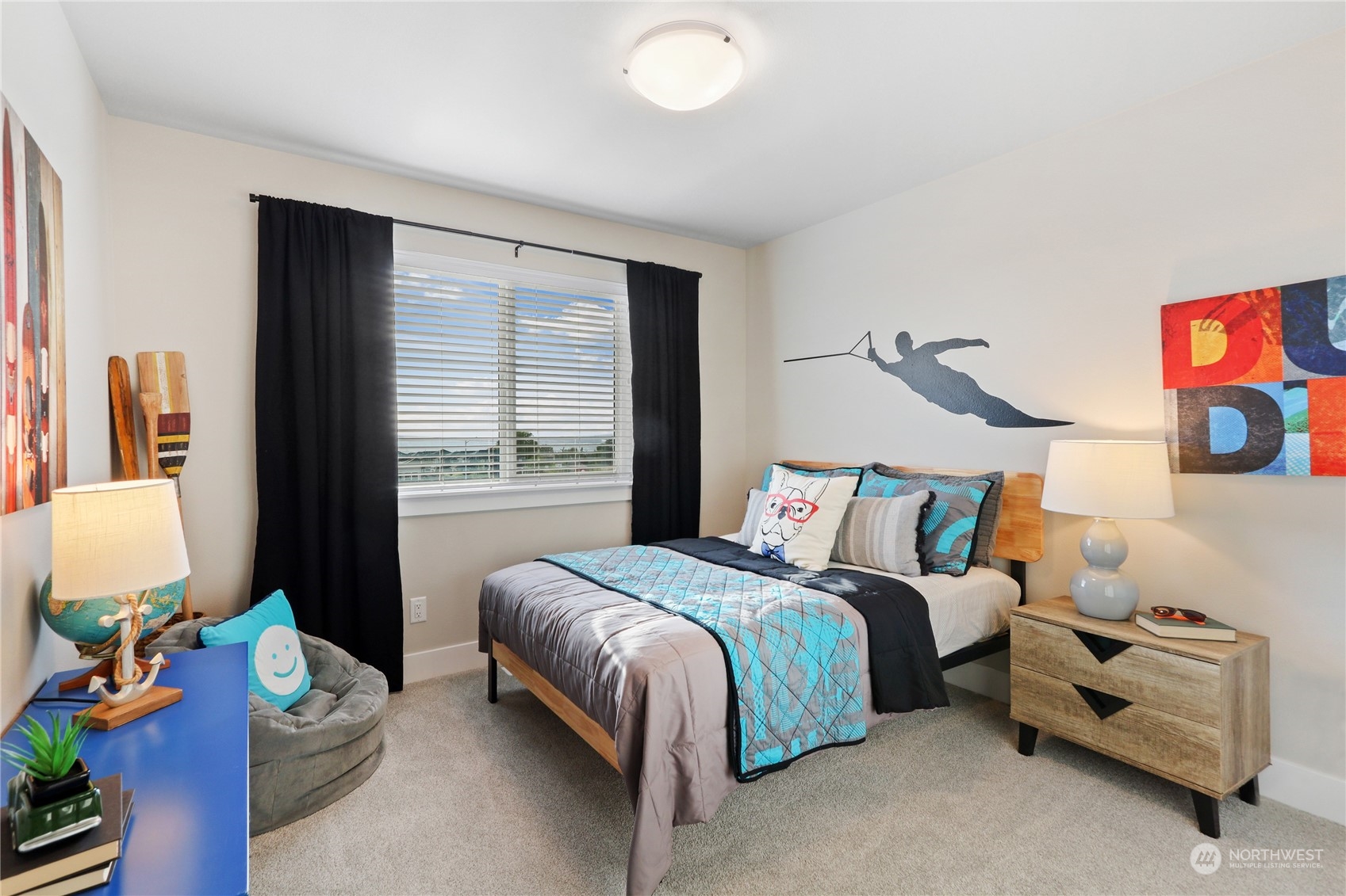 4418 242nd Place Southeast, Unit SL 25 Bothell, WA 98021 - Photo 26 of 36 a bedroom with a bed and a couch