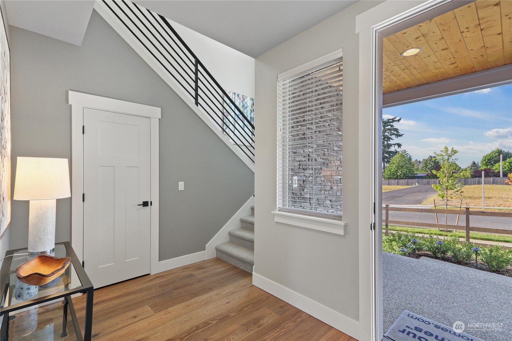 4418 242nd Place Southeast, Unit SL 25 Bothell, WA 98021 - Photo 4 of 36 a view of an entryway with wooden floor