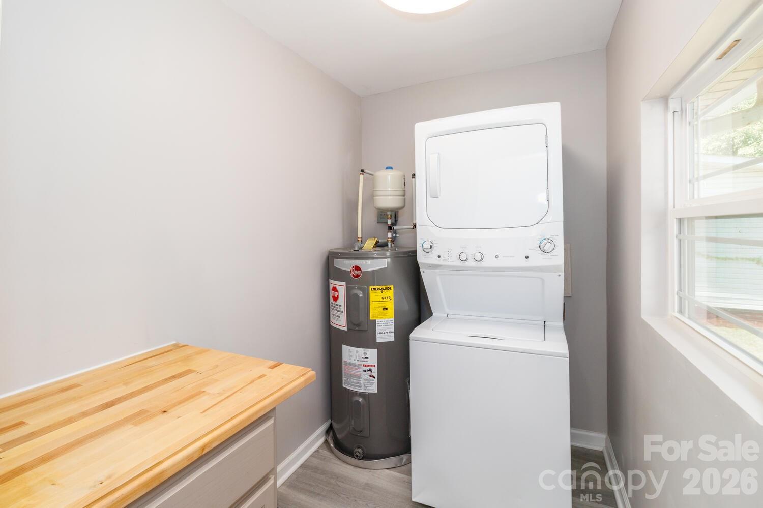 304 Bell Street Kannapolis, NC 28081 - Photo 12 of 27 a utility room with dryer and washer