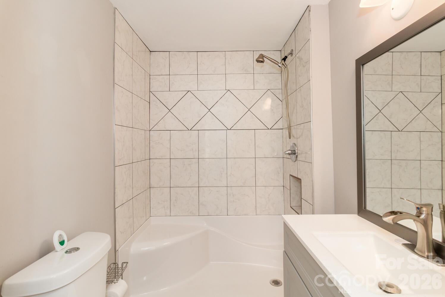 304 Bell Street Kannapolis, NC 28081 - Photo 17 of 27 a bathroom with a sink and toilet