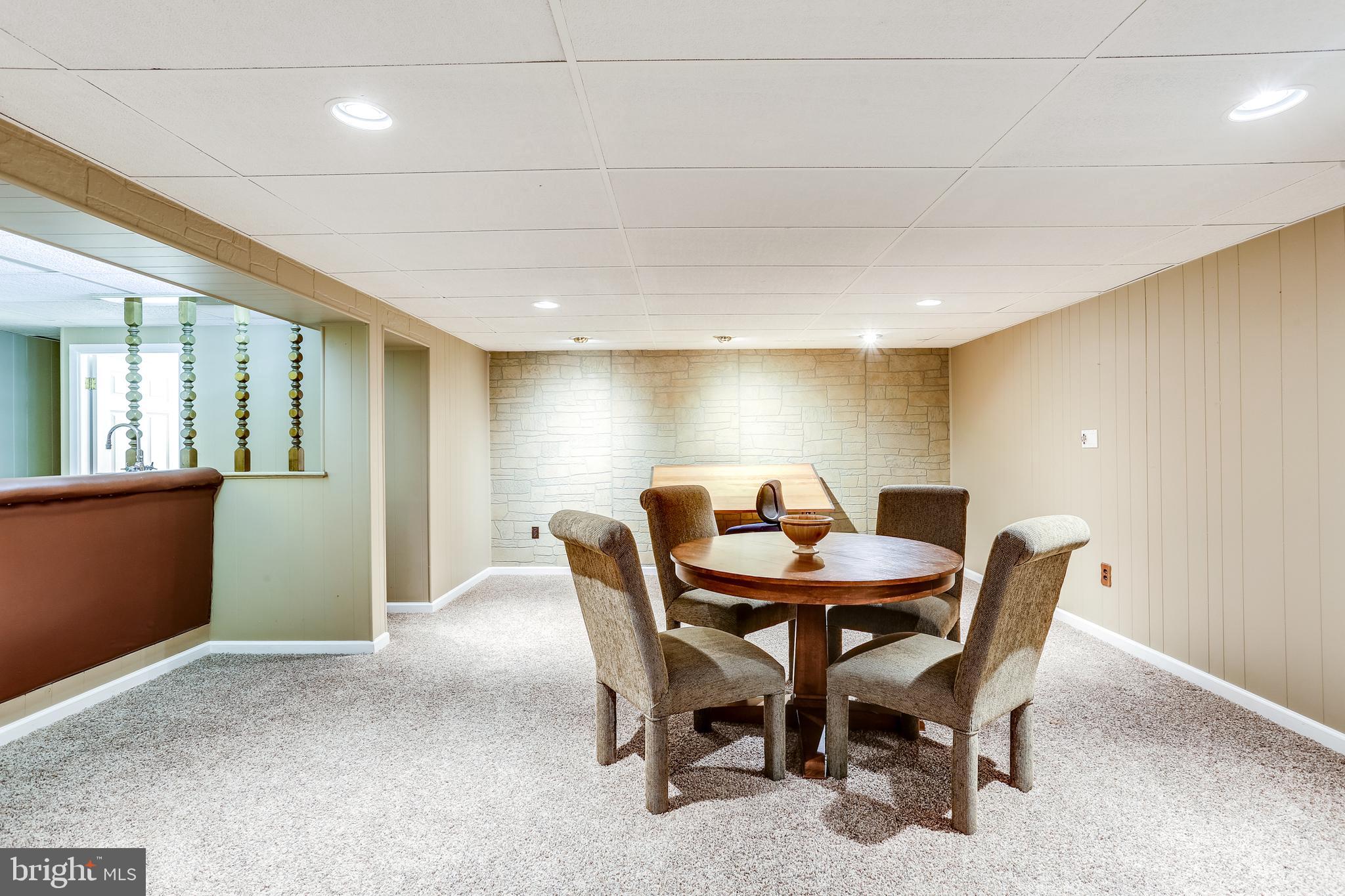 3981 High Point Road Ellicott City, MD 21042 - Photo 25 of 38 Recreation Room w/Wet Bar & paneled Accent Wall.
