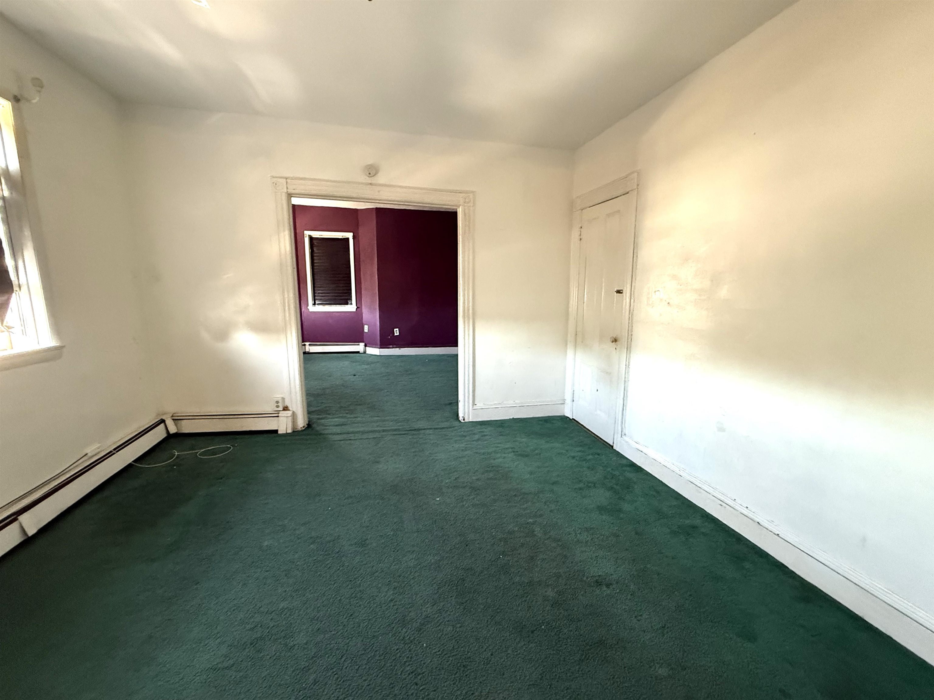 910-912 Broadway, Unit 3 Bayonne, NJ 07002 - Photo 4 of 10 an empty room with windows