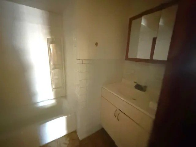 a car parked in front of a house