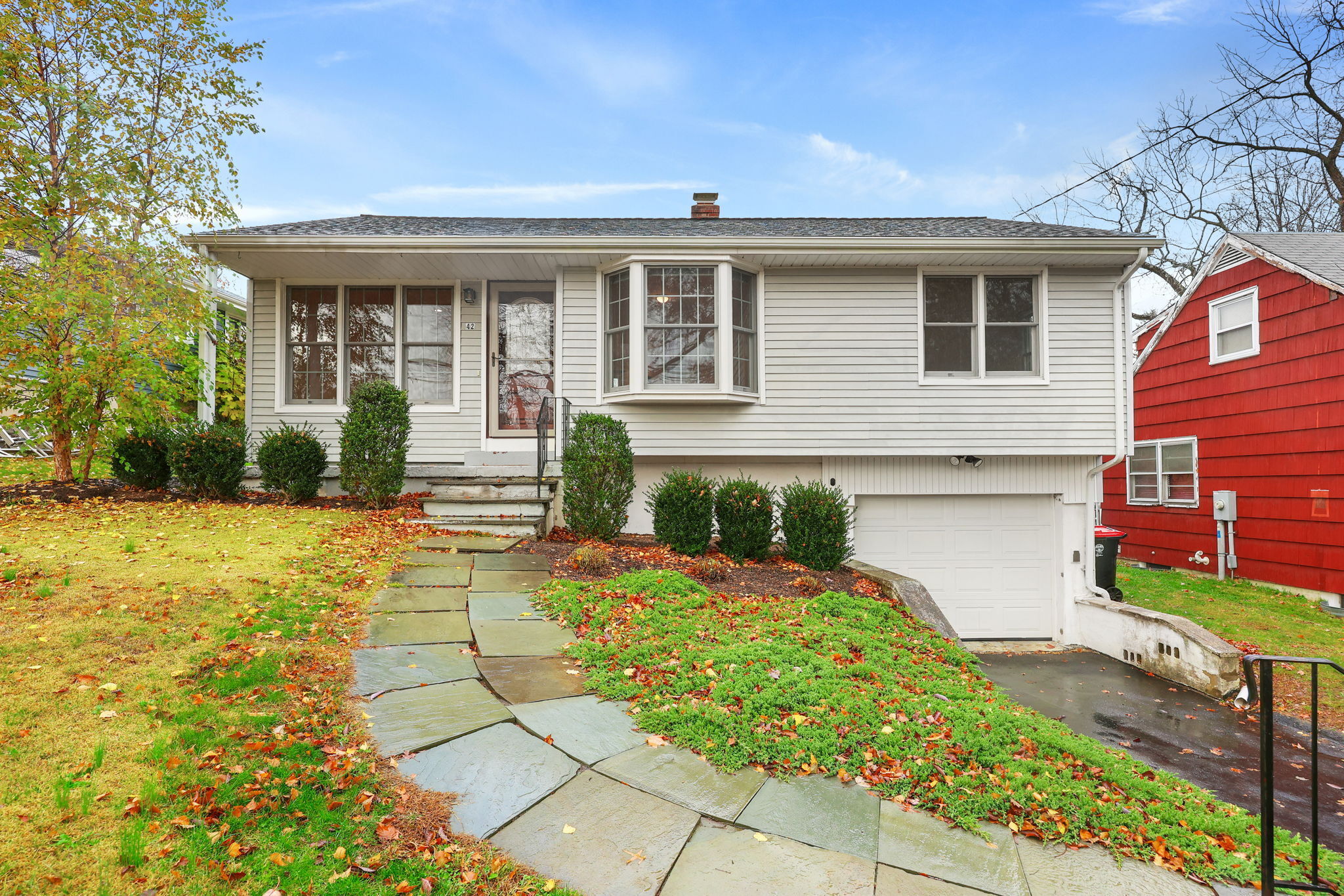 42 County Street Norwalk, CT 06851 - Photo 1 of 1 a front view of a house with garden