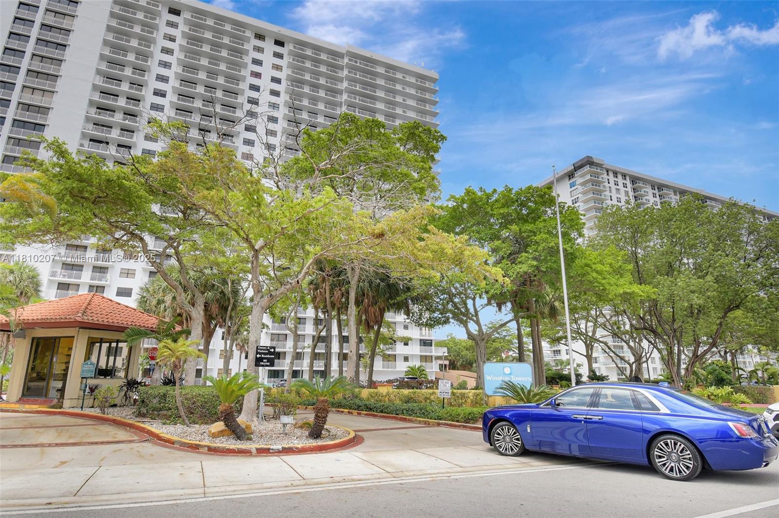 210 174th Street, Unit 2212 Sunny Isles Beach, FL 33160 - Photo 13 of 39 a car parked in front of a building