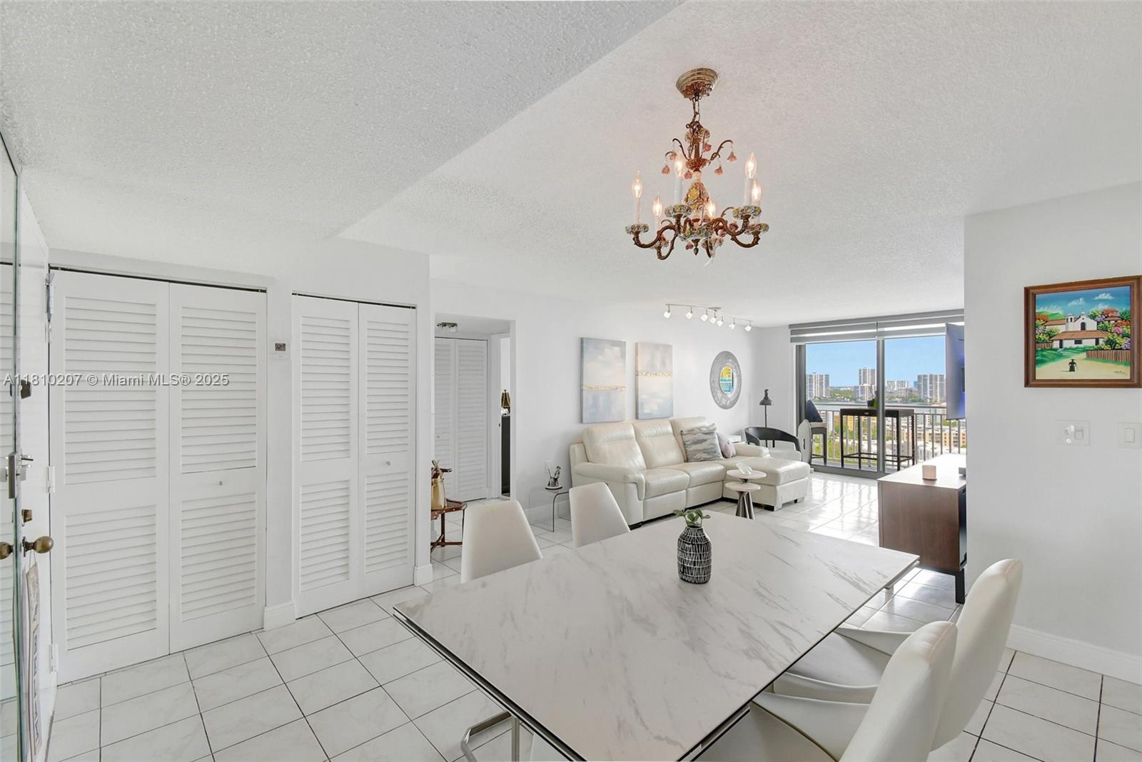 210 174th Street, Unit 2212 Sunny Isles Beach, FL 33160 - Photo 17 of 39 a living room with furniture